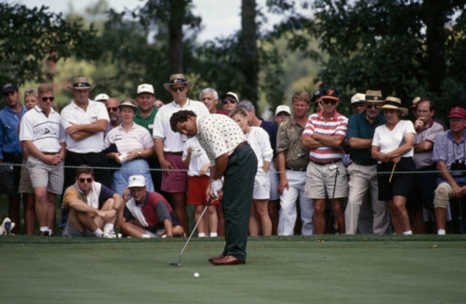 Fulton Allem putting in front of a gallery of spectators